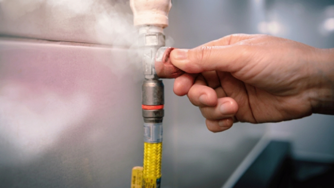 A pipe with leaking gas